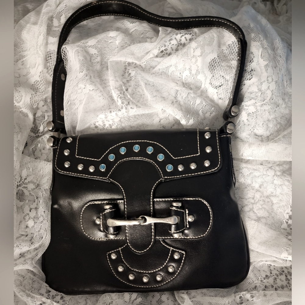 Western Style handbag in black leather, rhinestones, and a horsebit closure.